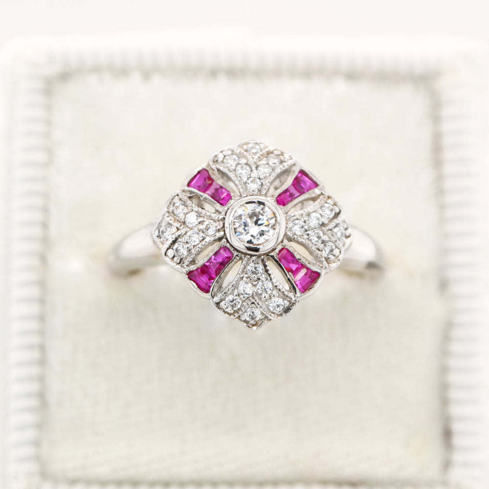 Art deco cross ring in white gold with ruby and diamond