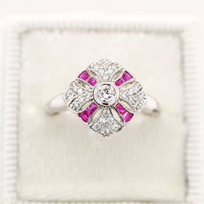 Art deco cross ring in white gold with ruby and diamond
