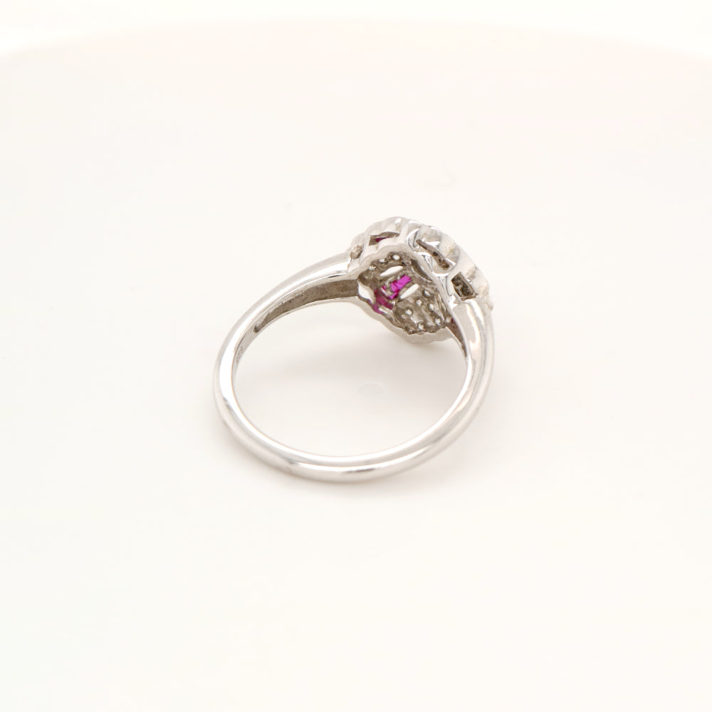 Art deco cross ring in white gold with ruby and diamond