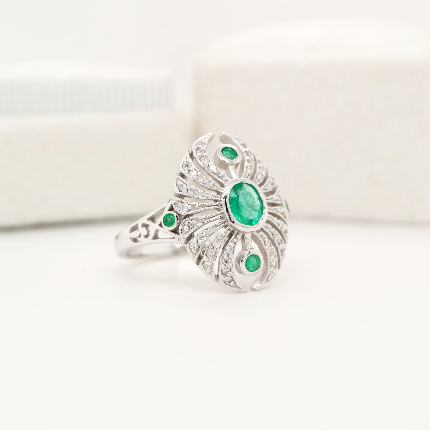Scarab diamond and emerald ring in white gold