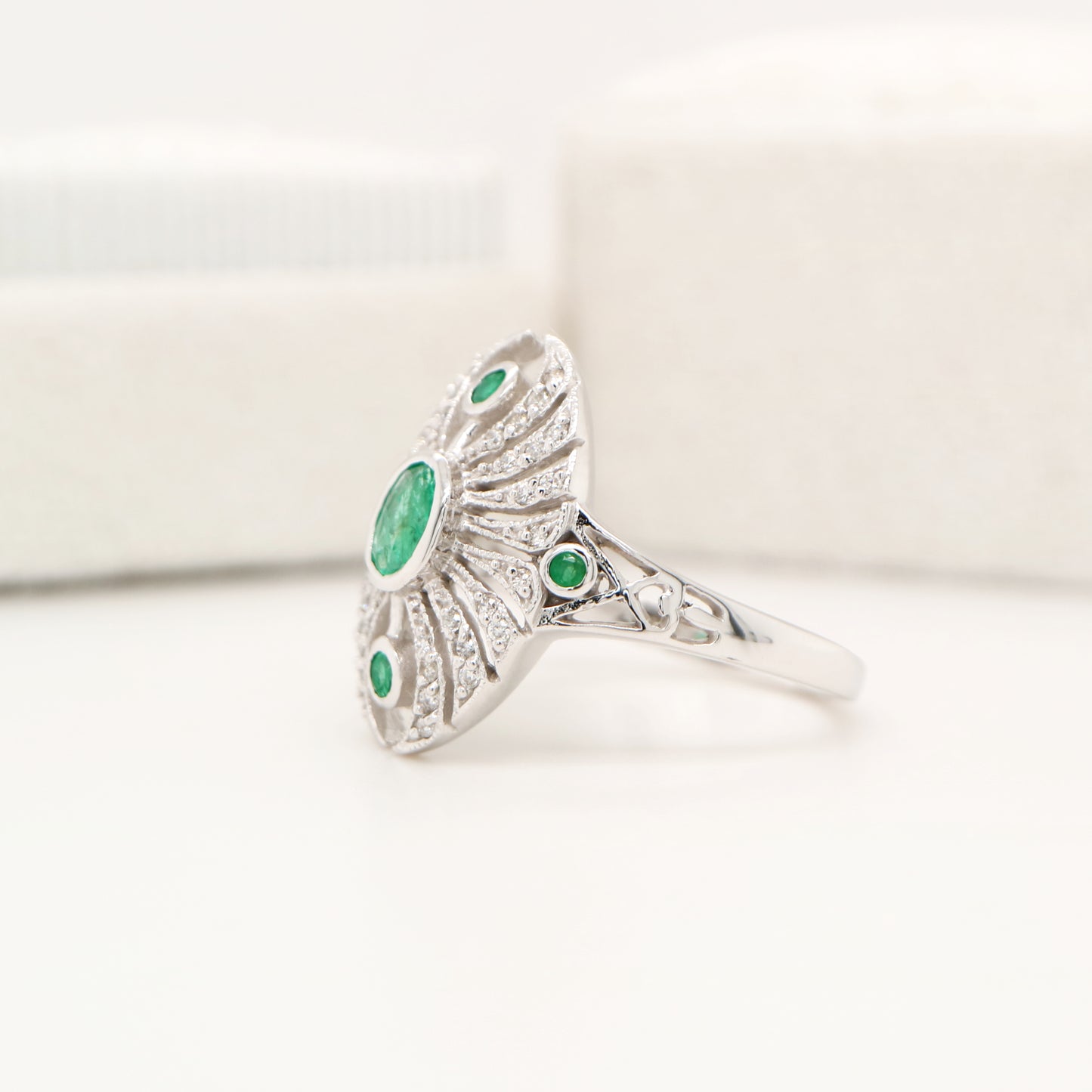 Scarab diamond and emerald ring in white gold