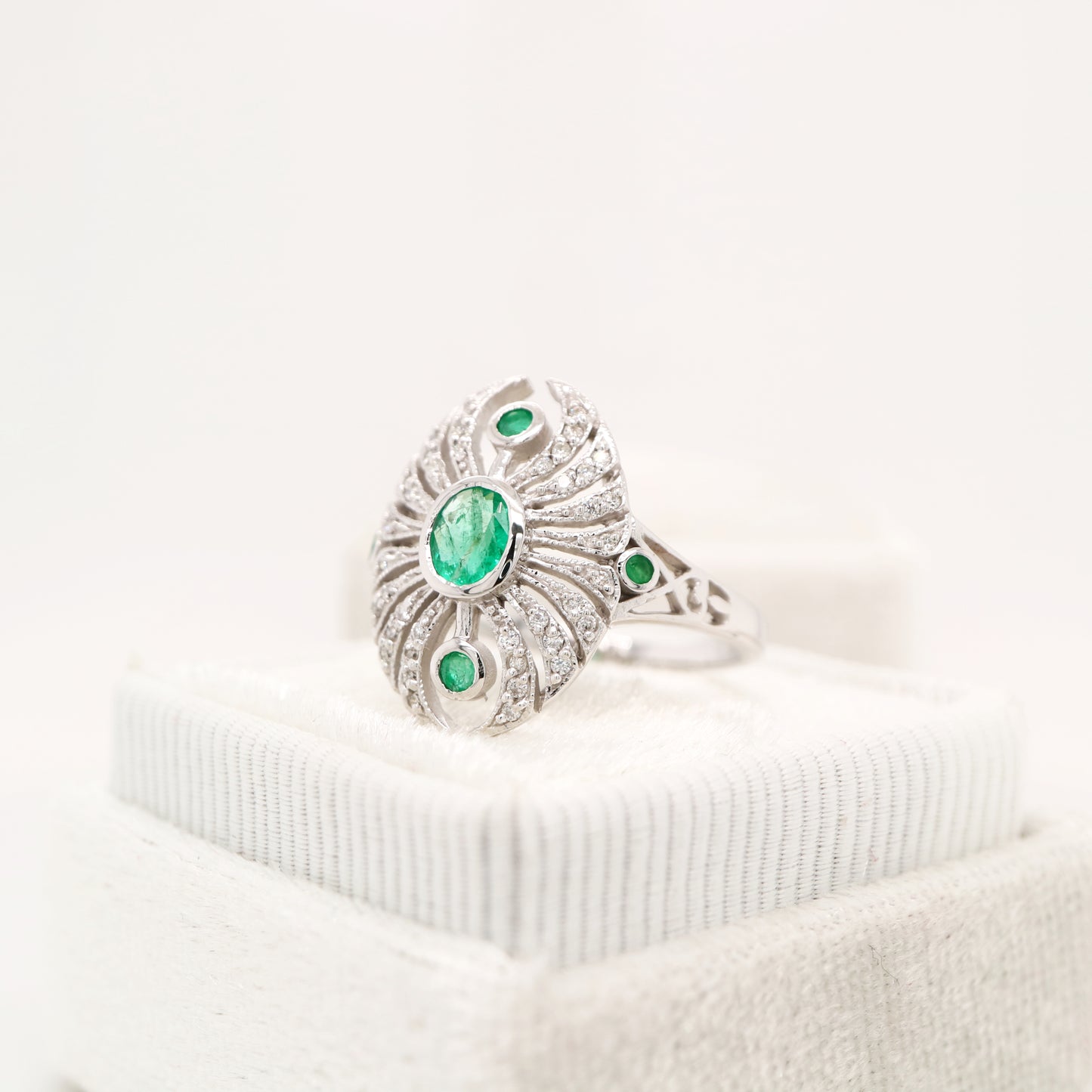 Scarab diamond and emerald ring in white gold