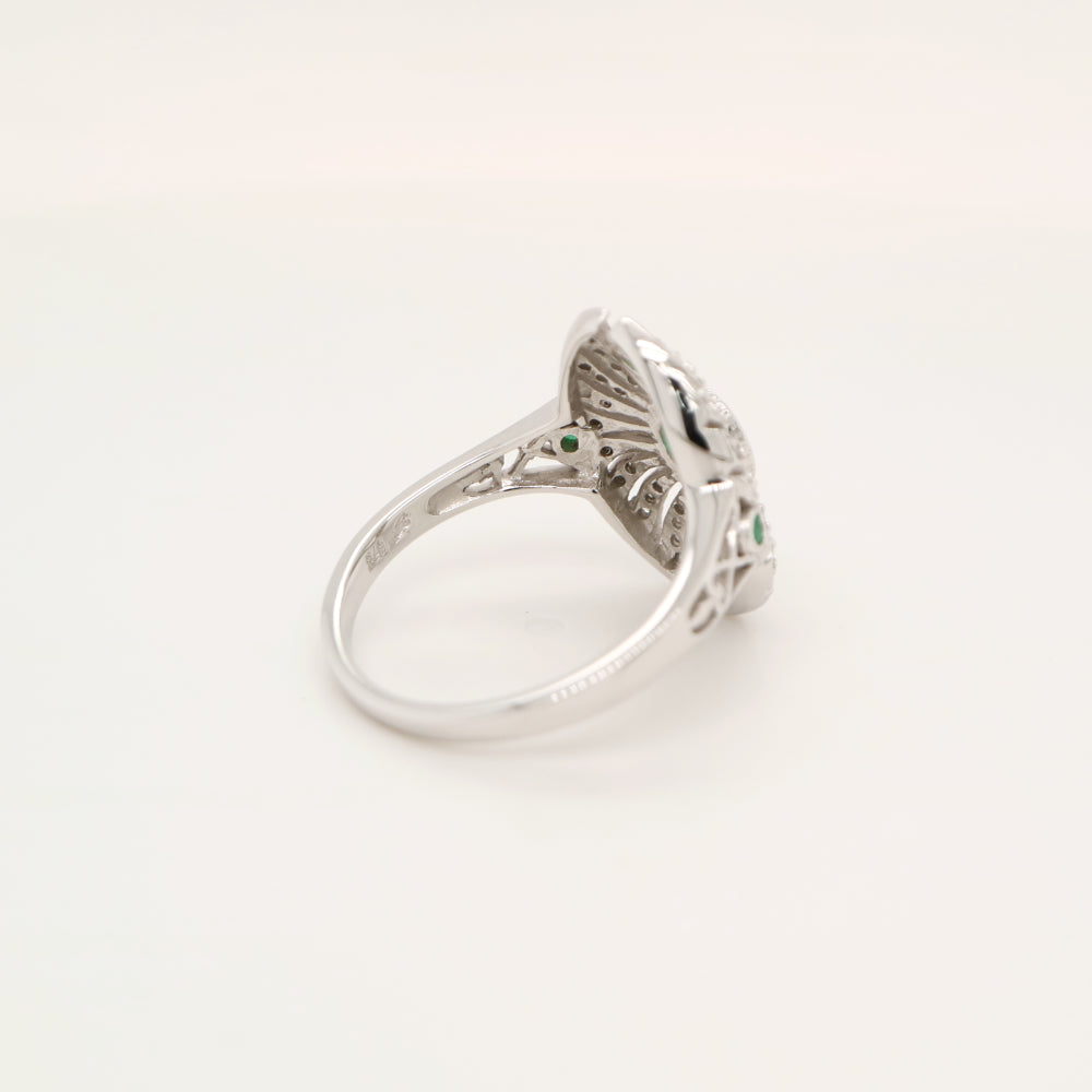 Scarab diamond and emerald ring in white gold