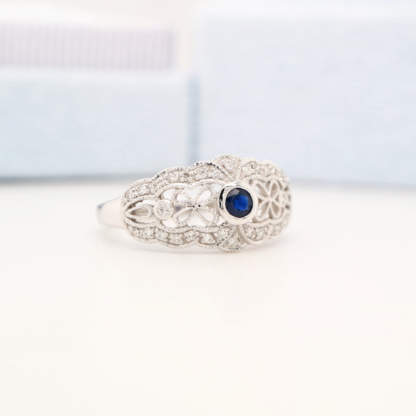 White gold lace art deco ring with sapphire and diamonds