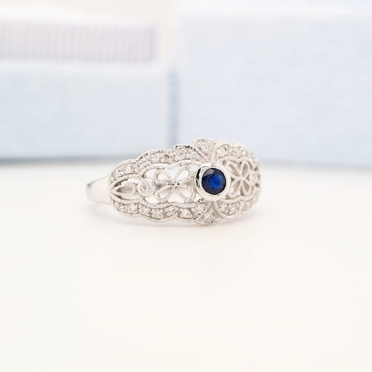 White gold lace art deco ring with sapphire and diamonds