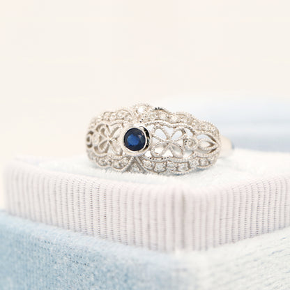 White gold lace art deco ring with sapphire and diamonds