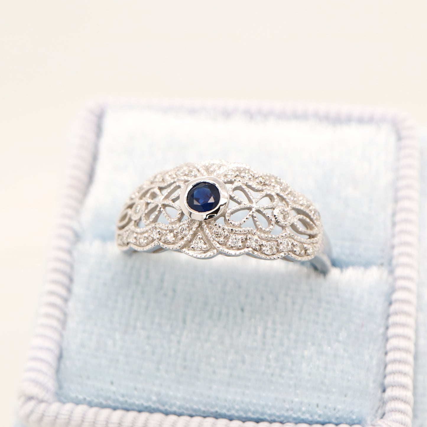 White gold lace art deco ring with sapphire and diamonds