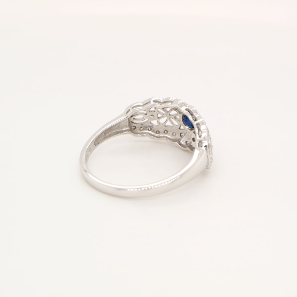 White gold lace art deco ring with sapphire and diamonds