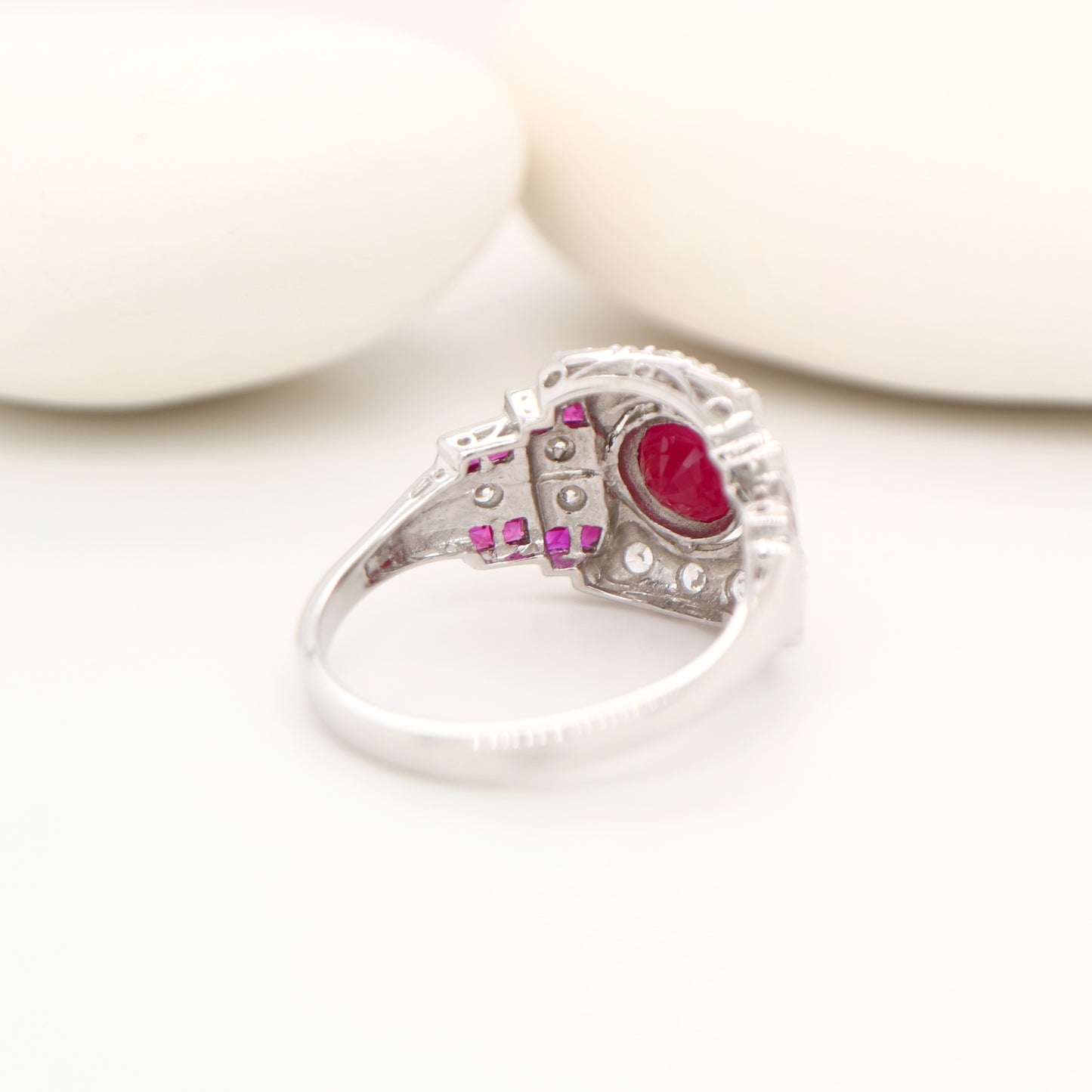 Art deco cocktail ring with ruby and diamond in 9k white gold