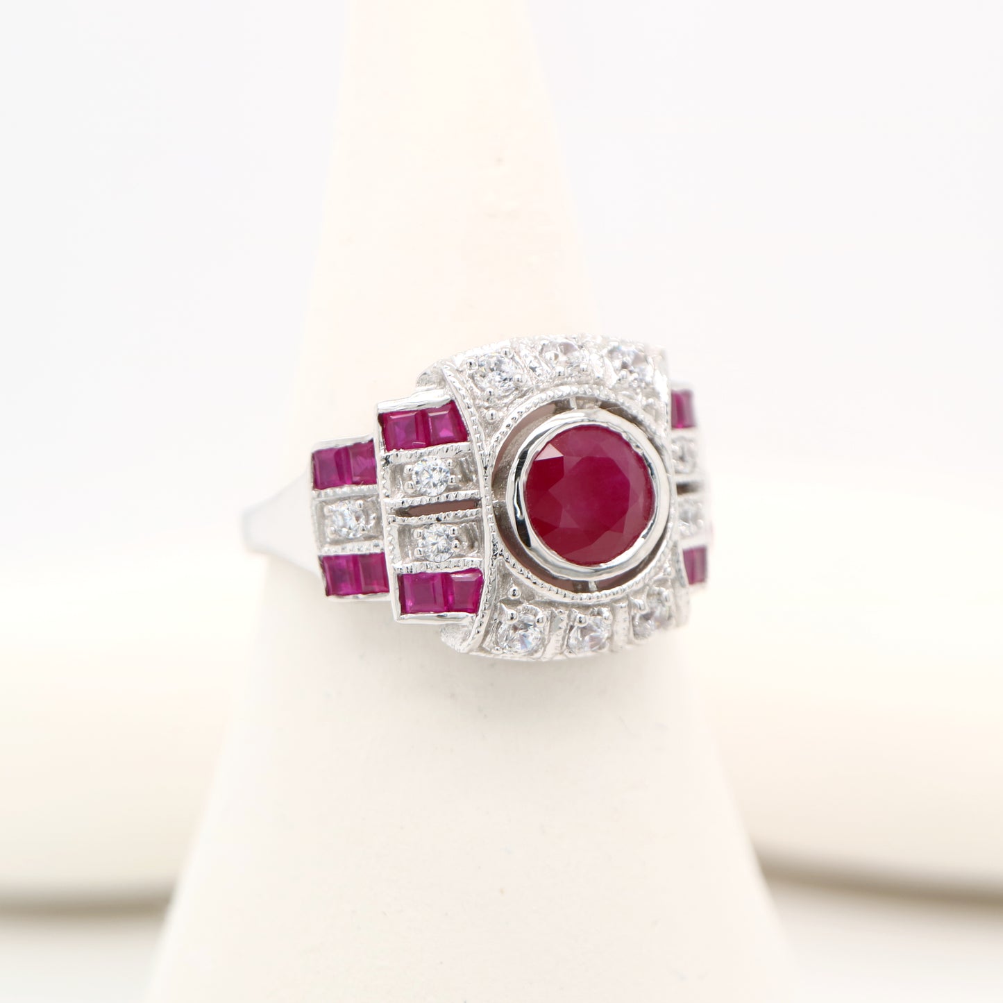 Art deco cocktail ring with ruby and diamond in 9k white gold