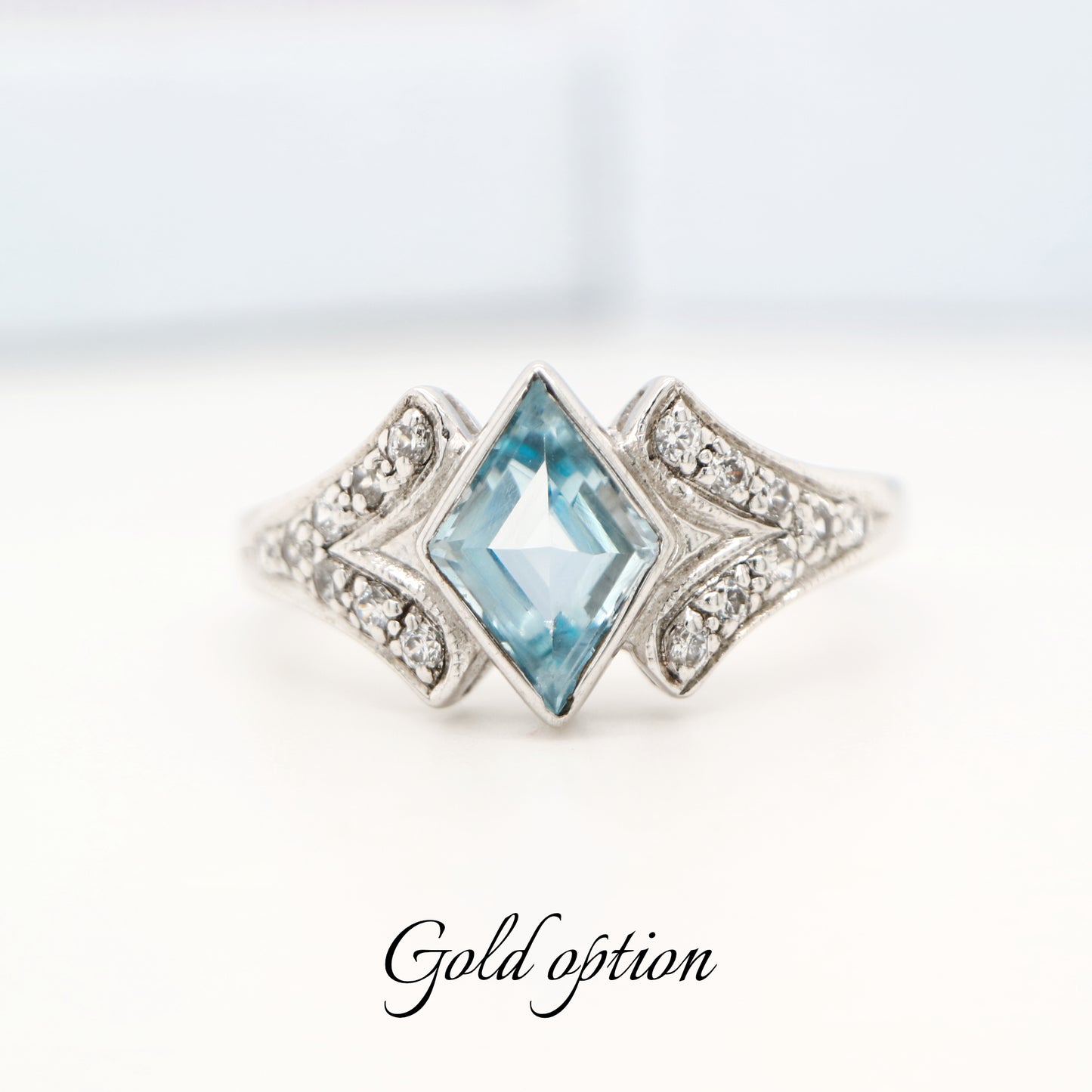 Diamond shape aquamarine with diamond in white gold