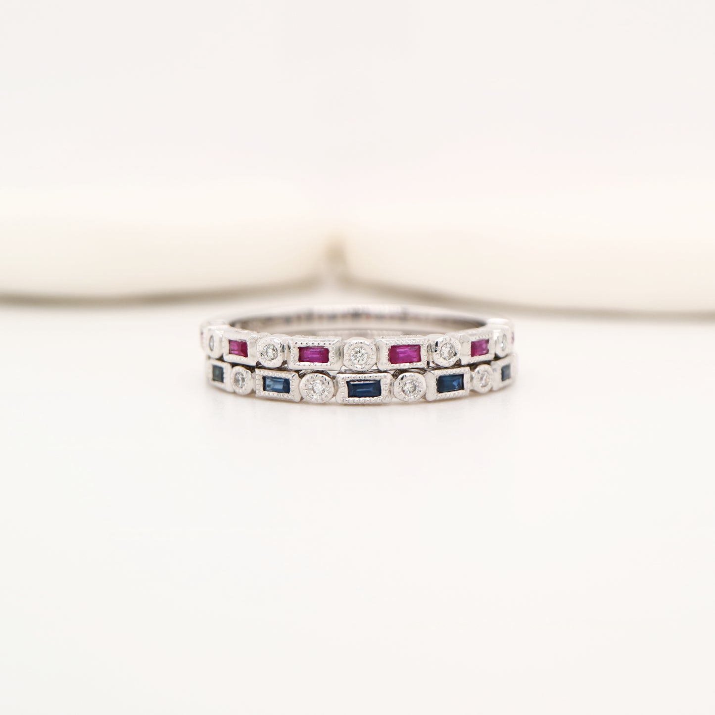 Art deco half set band in solid white gold with sapphires and diamonds