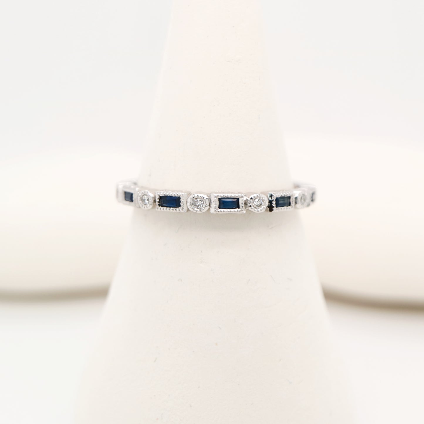 Art deco half set band in solid white gold with sapphires and diamonds