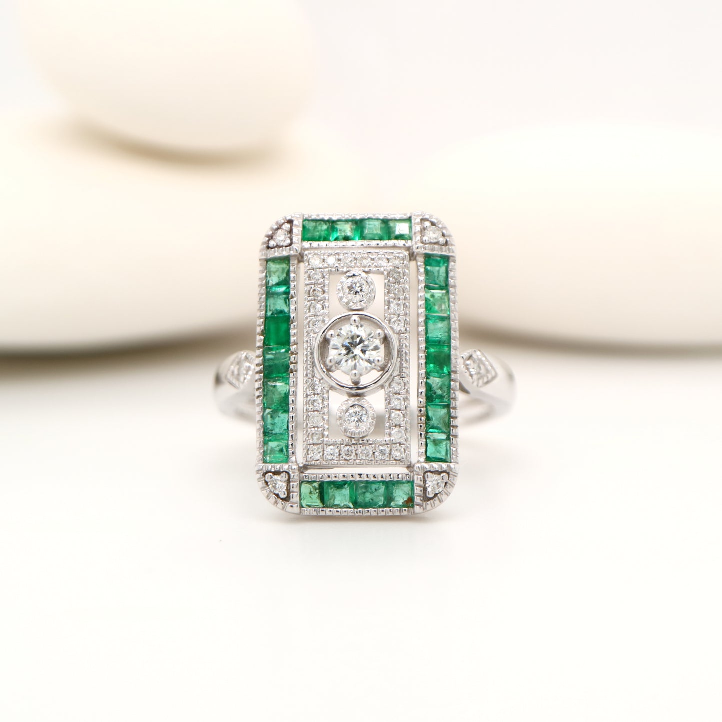 Art deco style channel set white gold ring - emerald