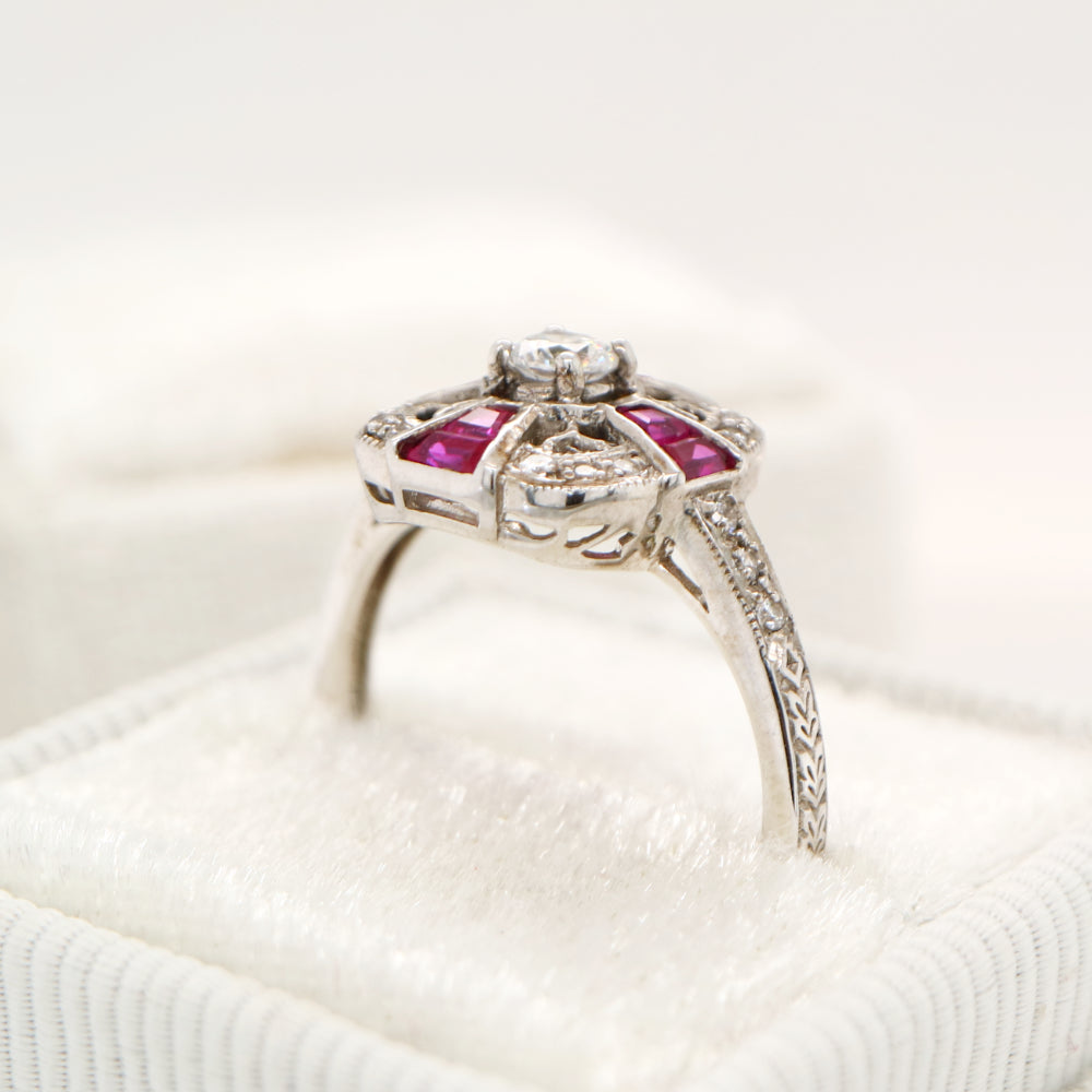Art deco ruby cross ring in white gold with diamond