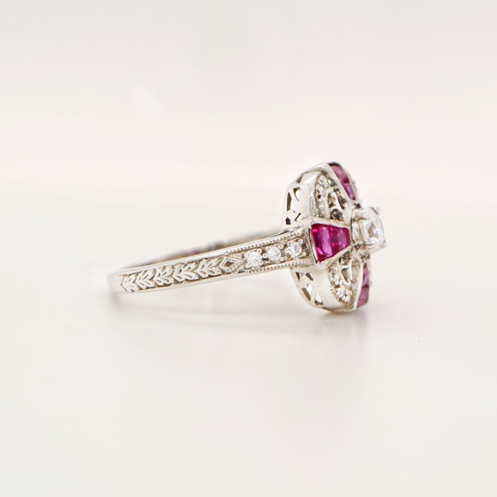 Art deco ruby cross ring in white gold with diamond