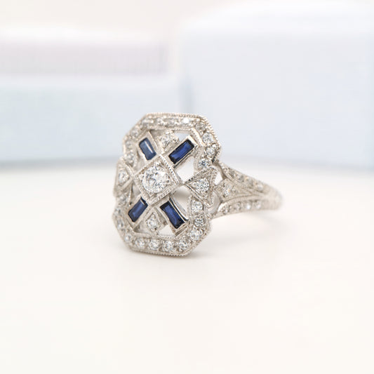 Sterling silver and cz shield ring with laboratory-grown sapphire accents