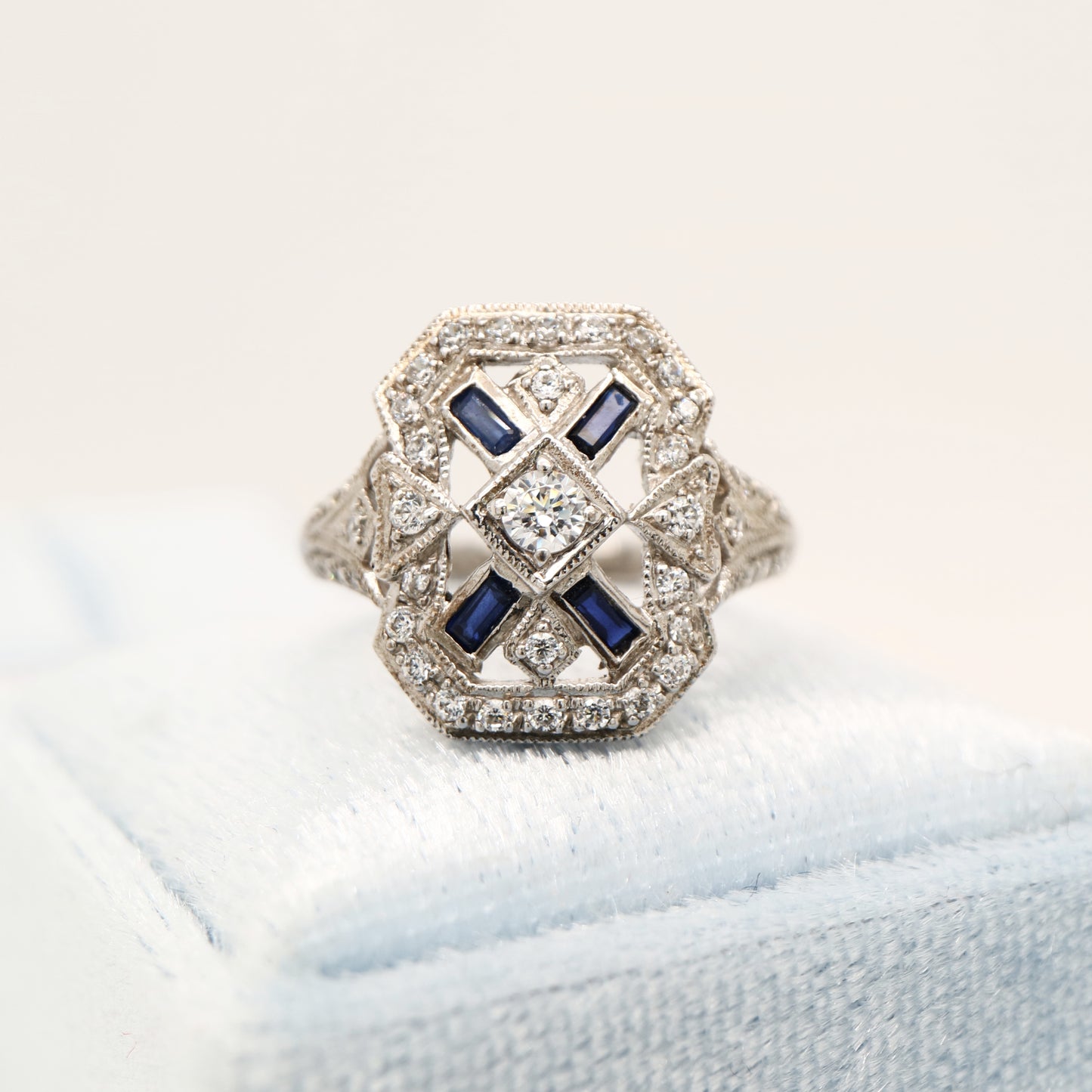 Sterling silver and cz shield ring with laboratory-grown sapphire accents