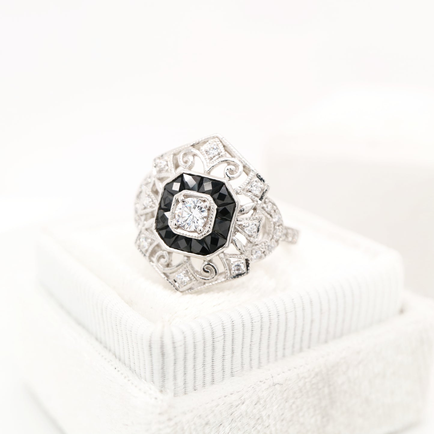 Sterling silver cocktail ring with French cut onyx and cz