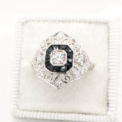 Sterling silver cocktail ring with French cut onyx and cz