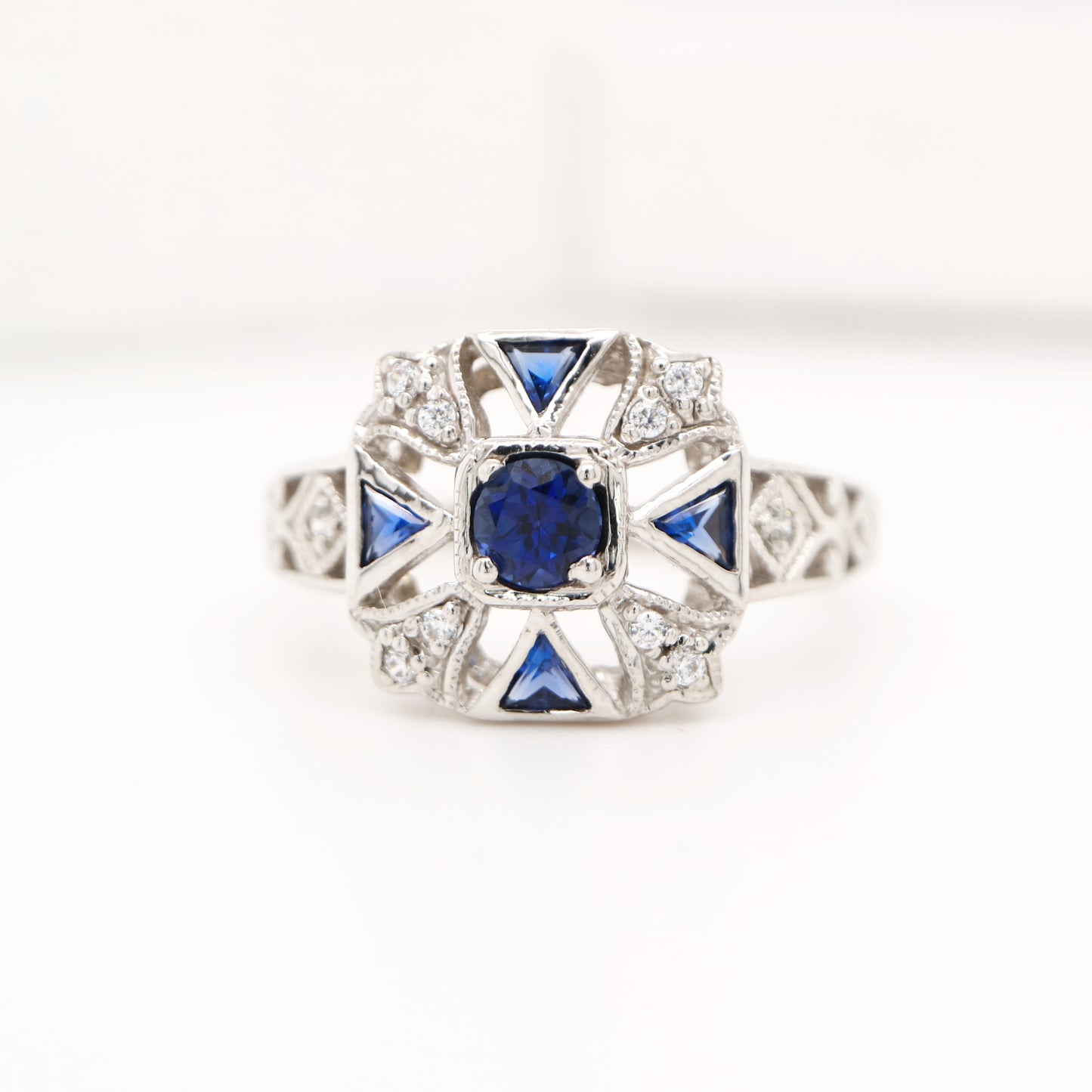 Vintage ring with laboaratory grown sapphire and cz in sterling silver