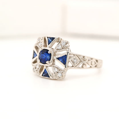 Vintage ring with laboaratory grown sapphire and cz in sterling silver