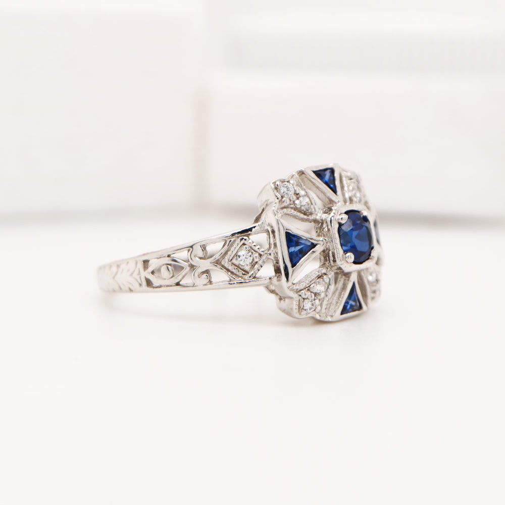 Vintage ring with laboaratory grown sapphire and cz in sterling silver