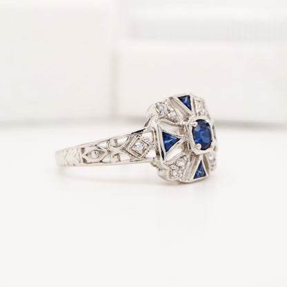 Vintage ring with laboaratory grown sapphire and cz in sterling silver