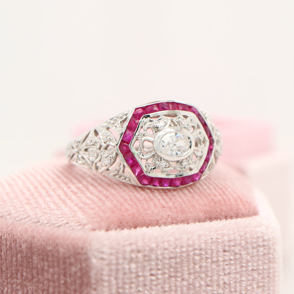 Art deco white gold ring with diamond and ruby halo