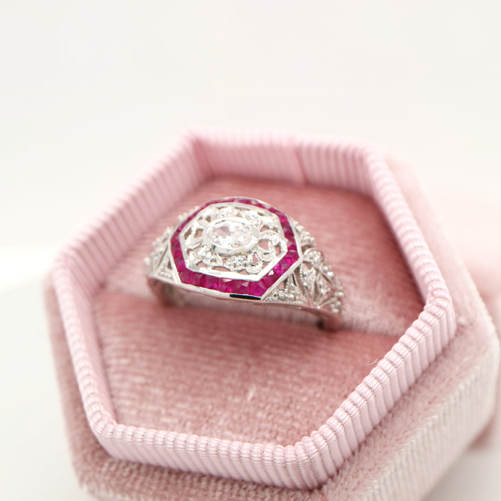 Art deco white gold ring with diamond and ruby halo