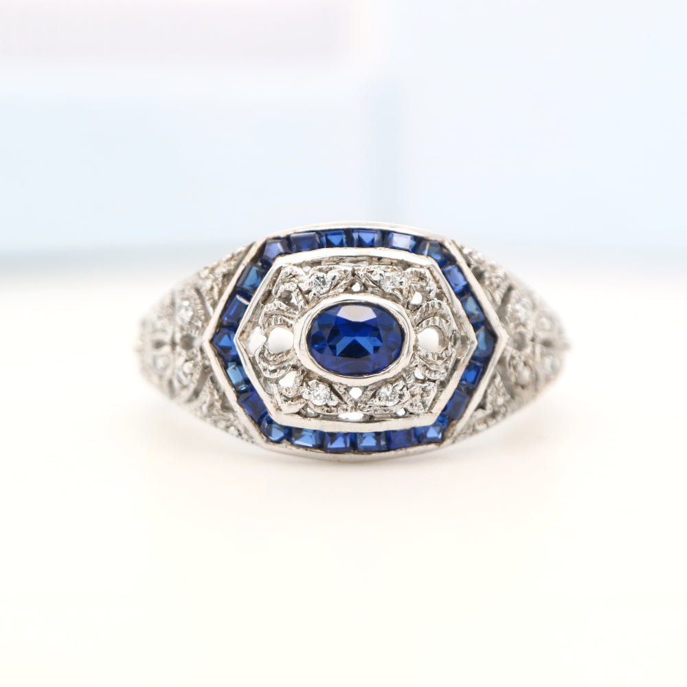 Art deco white gold ring with sapphire and diamond halo  - sapphire centre stone