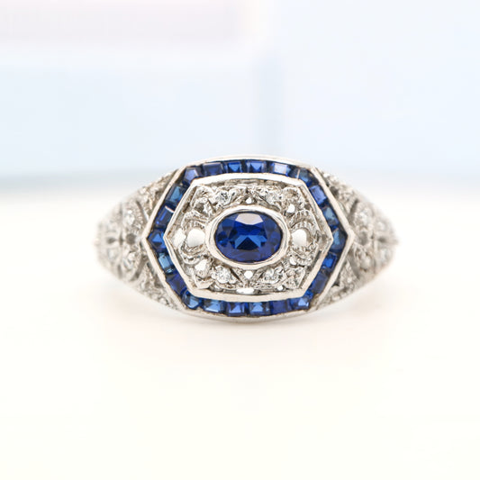 Art deco white gold ring with sapphire and diamond halo  - sapphire centre stone