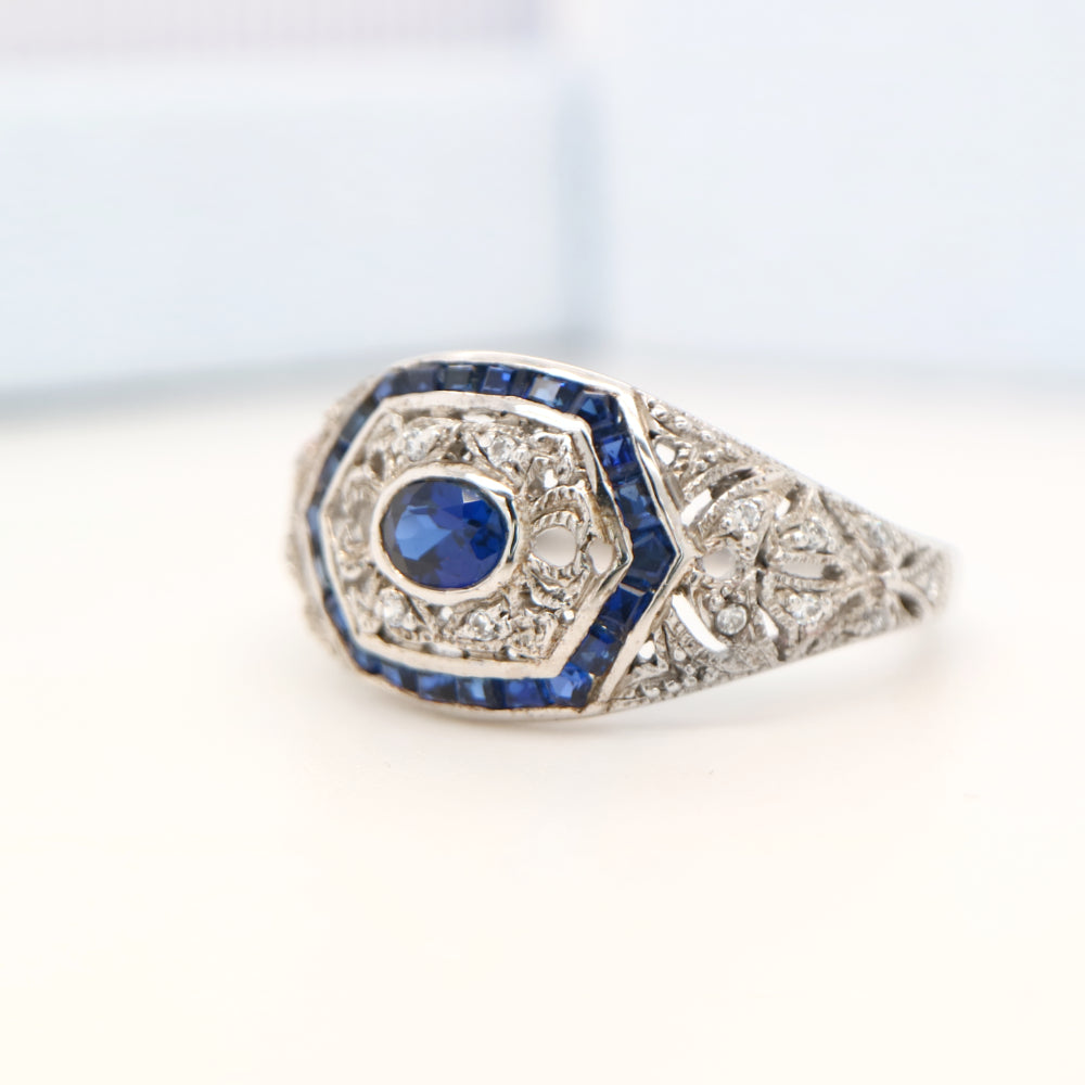 Art deco white gold ring with sapphire and diamond halo  - sapphire centre stone