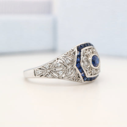 Art deco white gold ring with sapphire and diamond halo  - sapphire centre stone