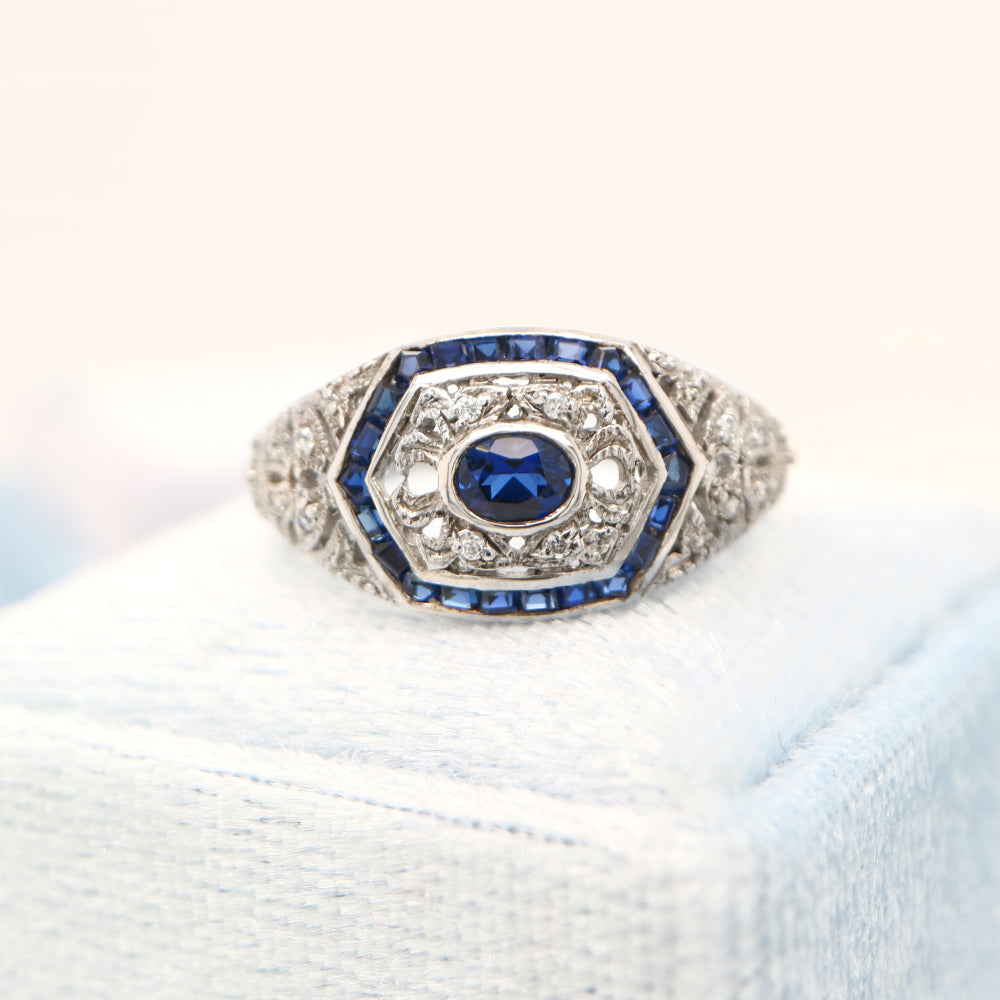 Art deco white gold ring with sapphire and diamond halo  - sapphire centre stone