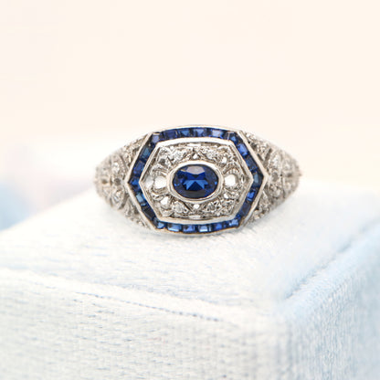 Art deco white gold ring with sapphire and diamond halo  - sapphire centre stone