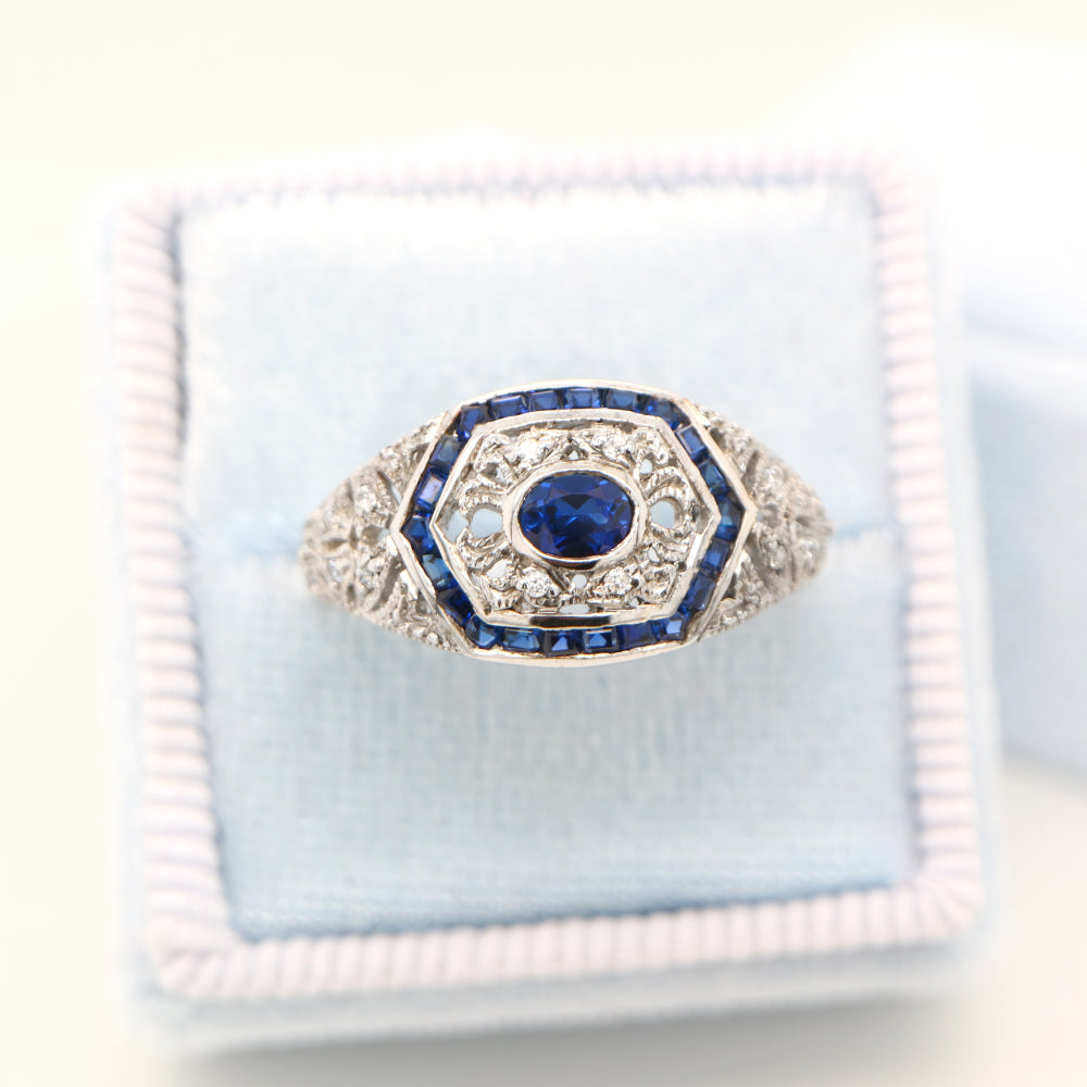 Art deco white gold ring with sapphire and diamond halo  - sapphire centre stone
