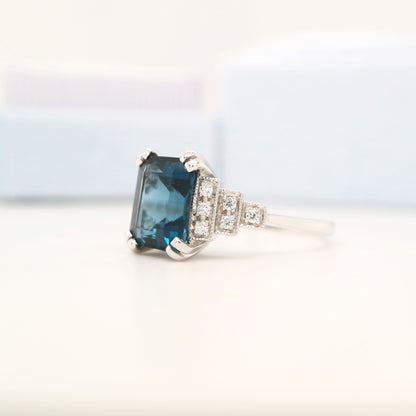 London blue topaz solitaire with diamonds in white gold