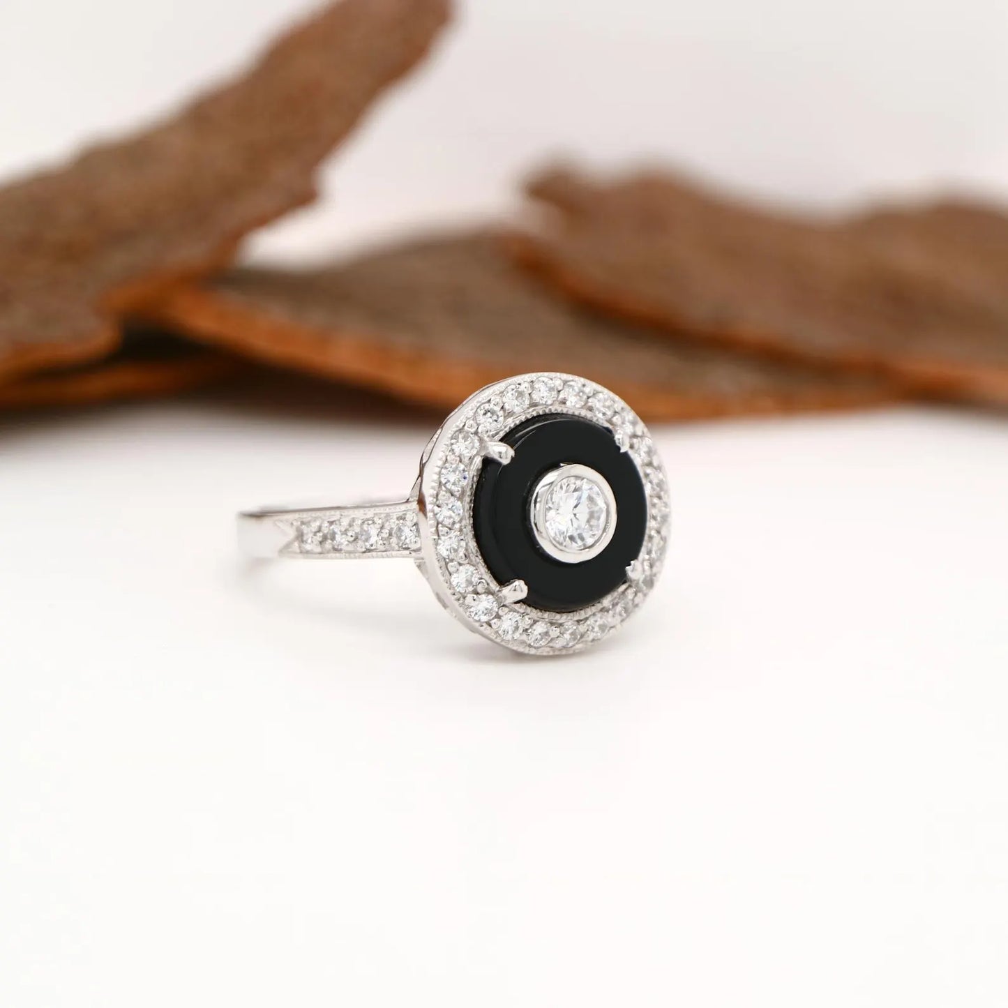 Round art deco style diamond and black onyx ring in white gold