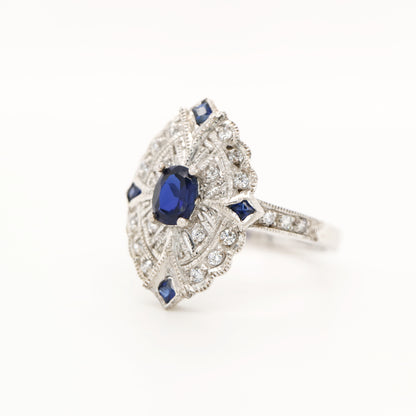 Vintage shield white gold ring with sapphire centre and corner stones