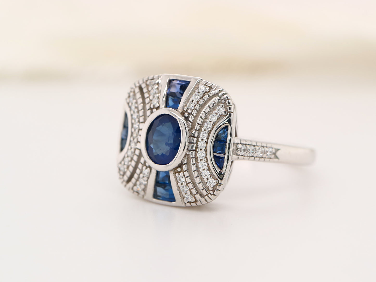 White gold art deco sapphire gem cluster ring
