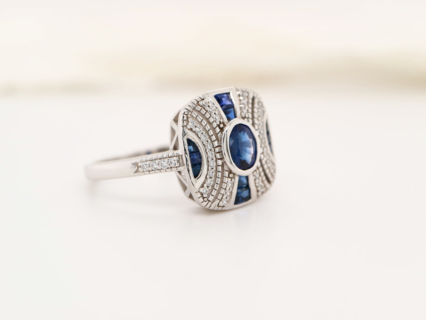 White gold art deco sapphire gem cluster ring