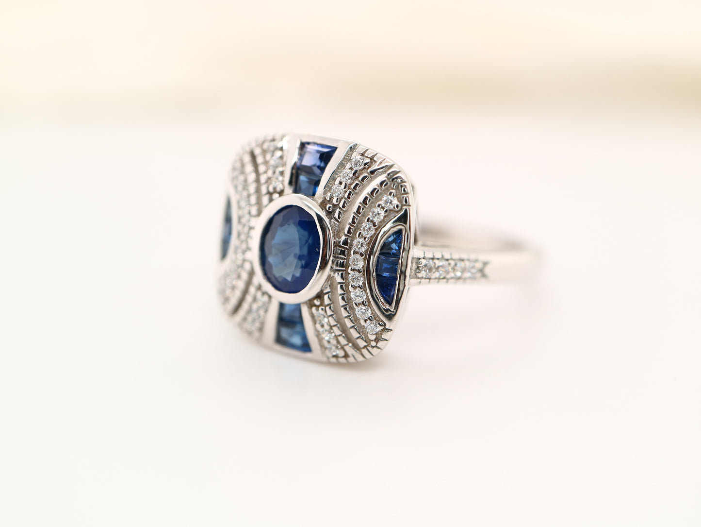 White gold art deco sapphire gem cluster ring