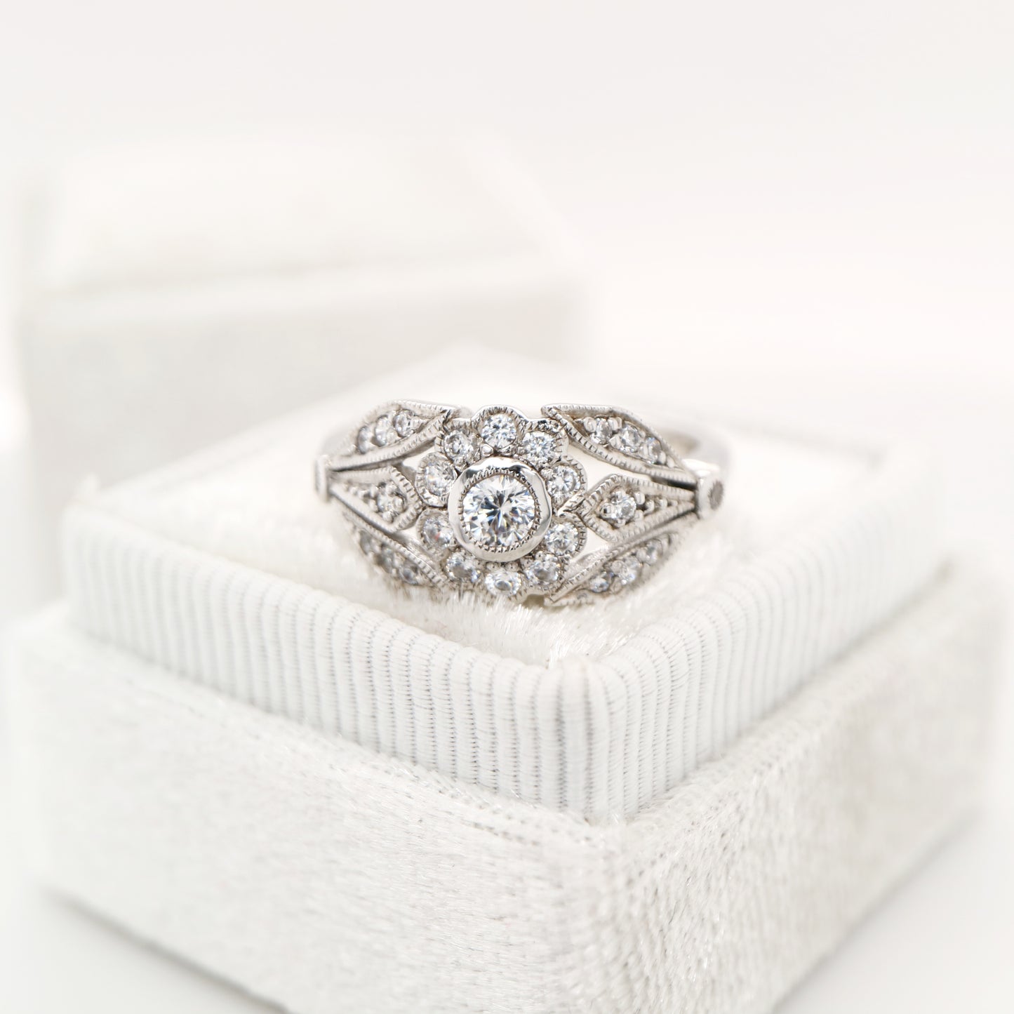 Flower and petal ring with CZ in Sterling Silver