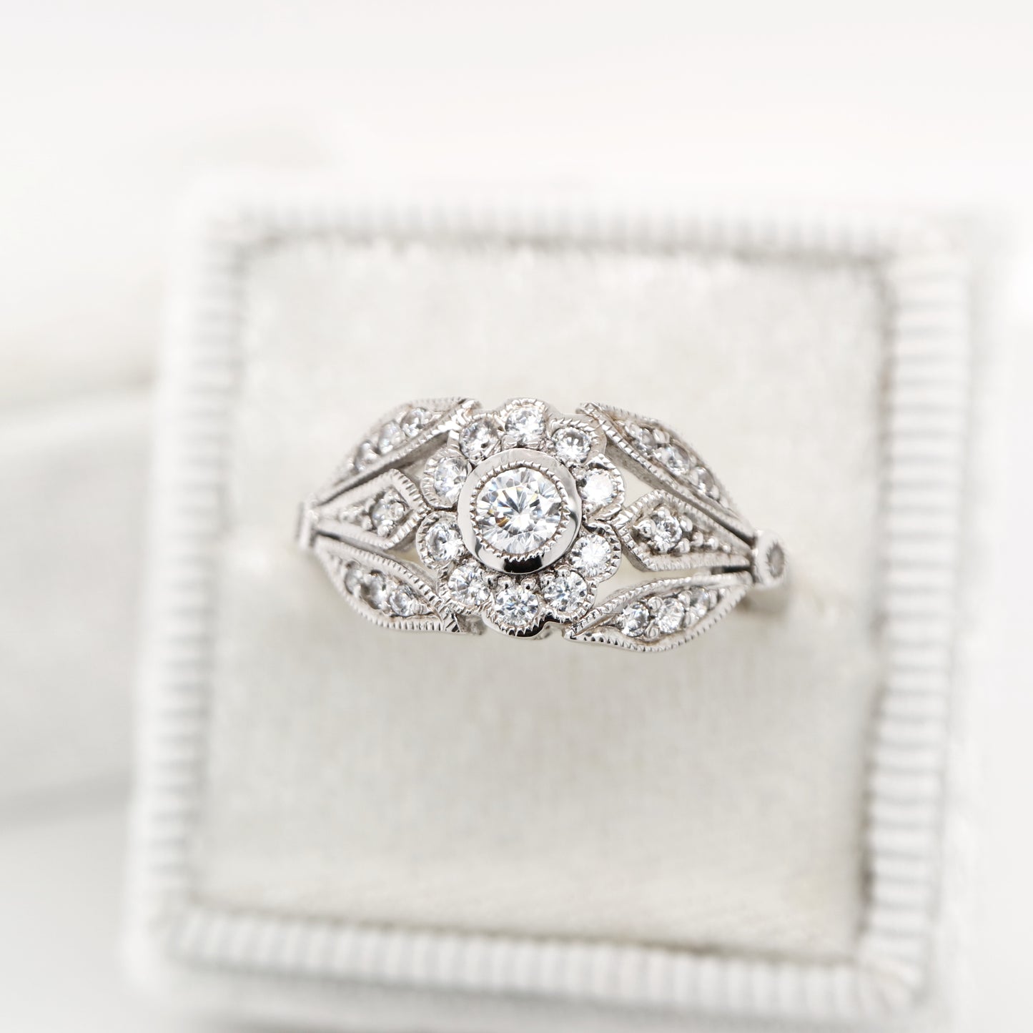 Flower and petal ring with CZ in Sterling Silver