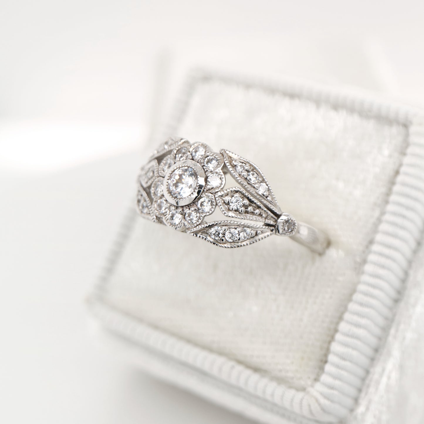 Flower and petal ring with CZ in Sterling Silver