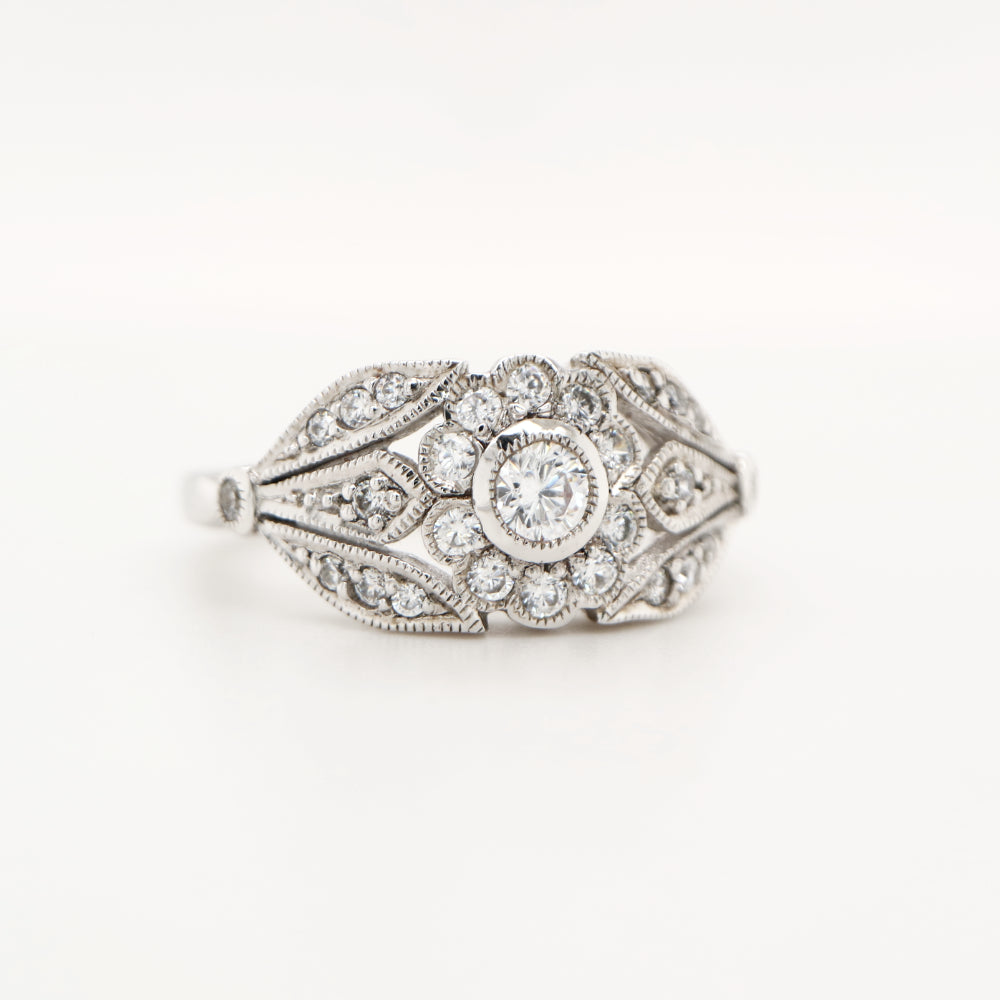 Flower and petal ring with CZ in Sterling Silver