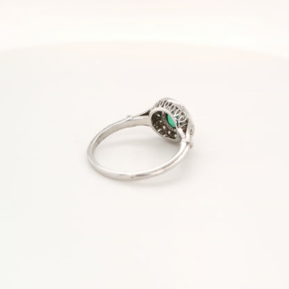 Laboratory grown emerald with CZ halo ring in sterling silver