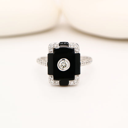 Art deco step cut ring with onyx and diamond in white gold