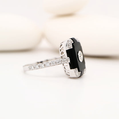 Art deco step cut ring with onyx and diamond in white gold